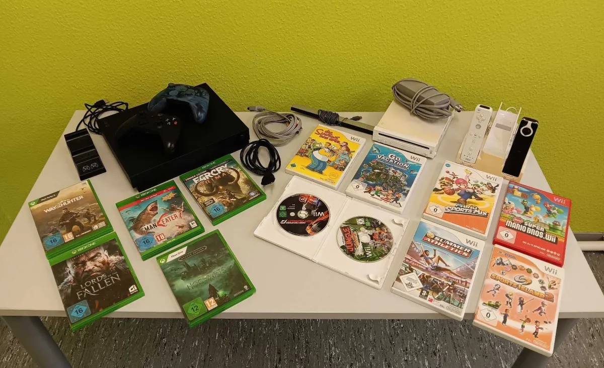 1 Xbox One X (1TB) with 2 controllers + 3 games & 1 Nintendo Wii + 8 games