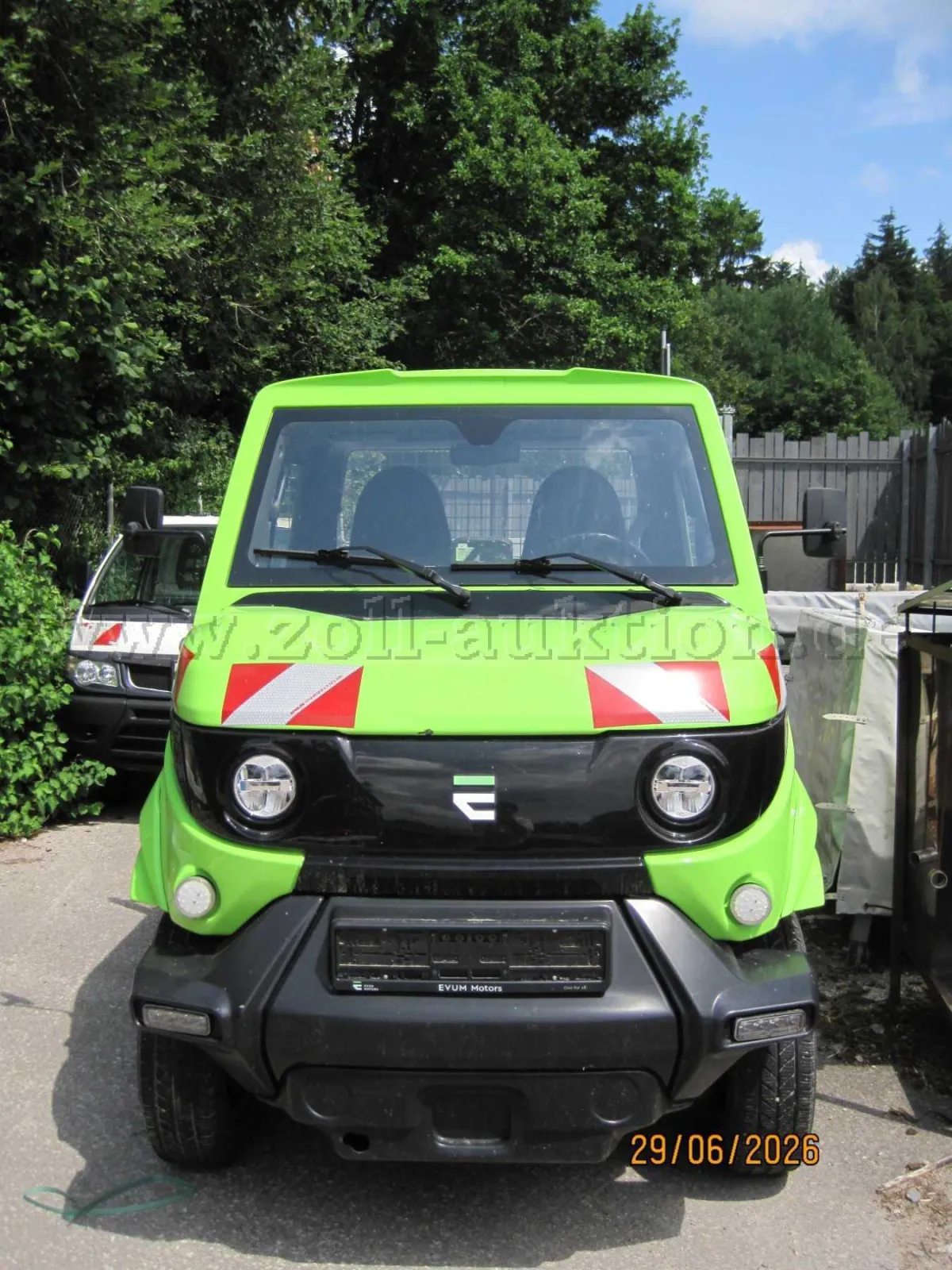 1 EVUM Motors aCar électrique 4x4 benne 3 côtés