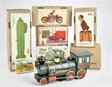 Lot de jouets en fer-blanc