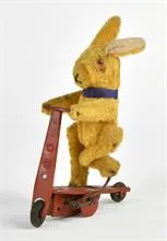 Konijn op scooter