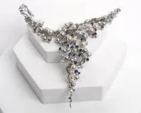 Collier, 18kt Weißgold, 42 Saphire, 38 Brillanten zus. ca. 1.80 ct., 36 Perlen, hellgrau und weiß, ø je ca. 5-7 mm, ca. 68 g, ca. 39 cm lang