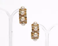 Paar Ohrstecker, Halbcreolen, 18kt Gelbgold, 54 Brillanten zus. ca. 1.80 ct., 8 Perlen ø ca. 8.5-9 mm, zus. ca. 42 g, 45 x 17 mm, Ohrstift klappbar