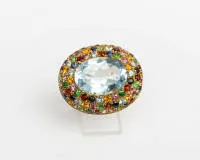 Ring, 18kt Gelbgold, Topas ca. 8.75 ct., Citrine, Turmaline, Saphire, Rhodolite, Savovite, Topase, zus. 3.23 ct., ca. 9.0 g, RM 55