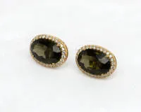 Paar Ohrstecker, 18kt Gelbgold, 2 Turmaline zus. ca. 7.71 ct., 56 Achtkant-Diamanten zus. ca. 0.14 ct., etwa w/si, ca. 4.2 g