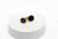 Paar Manschettenknöpfe, 8kt Gelbgold, blauer Farbstein, zus. ca. 13.4 g