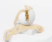 Parelketting, 6-rijig, sluiting 18kt geelgoud, parels ø ca. 5 mm, ca. 45 cm lang, schroefmoer ontbreekt