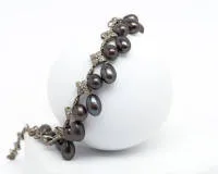 Collier, 18kt witgoud, ca. 290 kleine briljanten en diamanten, 26 ovale Tahiti parels, ca. 12 mm, ca. 46 g, ca. 42 cm, 1 parel los