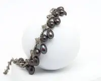 Collier, 18kt witgoud, ca. 290 kleine briljanten en diamanten, 26 ovale Tahiti parels, ca. 12 mm, ca. 46 g, ca. 42 cm, 1 parel los