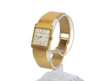 Audemars Piguet, ladies' wristwatch, 18kt yellow gold, rectangular case, back no. 26926, white dial with baton indices and signature "Audemars Piguet / Geneve / Swiss", hand-wound movement no. 86780, fine soldered link bracelet with...