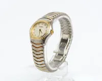 Ebel Classic Wave, damespolshorloge, bicolor staal/18kt geelgoud met diamanten lunette, ref. E1157F14-16, nr. 55614119, parelmoeren wijzerplaat met diamanten indexen en signatuur "EBEL", rondom lopende lunette in geelgoud met 42 kleine diamanten,...