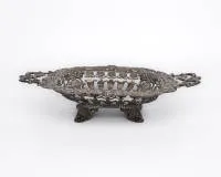 Bread basket, Carl Ludwig Fargel (1790 - 1832), 12-lot silver, Hanover, 1st third 19th c., mark BAHLSEN, 12 lot, walking lion in rectangle, master from 1821, supplier to Bahlsen, curved and broken-work basket with side handles, acanthus and rocaille decoration, 7.5 x 38 x 23 cm, total weight 399 g, repairs and solder joints