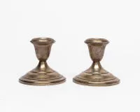 Pair of low candlesticks, sterling silver, vase-shaped socket on round stepped base, closed bottom, weighted base, H. approx. 8 cm, total approx. 534 g incl. weighting
