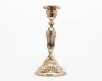 Candlestick, apparently silver, unmarked, handmade, vase-shaped socket on conical round stem on round base, chased fluting, weighted base, hallmarks probably polished away, H. 25.5 cm, approx. 887 g incl. weighting