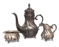Silver service, German, silver 800, coffee pot, cream jug, sugar bowl, baroque form with twisted flutes, pot 28 cm high, dedication underneath dated 1932, total approx. 1,329 g