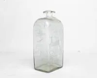 Brandweinflasche, 18./19. Jh., geschliffenes Dekor, u.a. springender Hirsch, H. 23 cm, Schulter mit Sprung im Glas