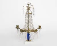 Neoclassical candlestick, Sweden, 19th century, bronze, two-light candlestick with glass pendants on marble base, cobalt blue glass element, H. 37 cm