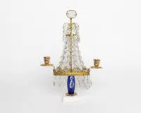 Classicist candlestick, Sweden, 19th c., gilded bronze, two-flame candlestick with glass pendants on marble base, cobalt blue glass element, H. 37 cm