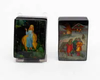 Two small Russian lacquer boxes, Palekh, 20th c., 7.5 x 6 x 4.5 cm and 8 x 5.5 x 2.5 cm.