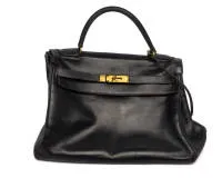 Vintage-Kelly Bag 32, Hermés, Paris, dunkelblaues Kalbsleder, vergoldete Hardware, ca. 22 x 32 x 11 cm, Gebrauchsspuren, Vergoldung teils berieben