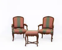 Pair of armchairs and a stool, Louis XV, Genoa / Italy, circa 1760, carved walnut, upholstery renewed