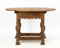 Table, 18th c., Alpine, oval maple top on braced baluster base in oak with wavy apron and drawer, one key, approx. 73 x 108 x 83 cm, top with old woodworm infestation