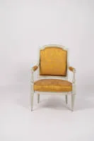 Fauteuil, Louis XVI, France, vers 1780, estampillé JEAN-BAPTISTE CLAUDE SENE, bois sculpté et peint gris clair, tissu doré, H. 94 cm, peinture reprise.