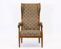 Fauteuil à oreilles, Biedermeier, 1er tiers du 19e s., merisier, éléments décoratifs ébonisés, revêtement floral usé, H. 119 cm