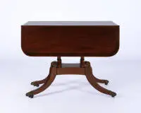 Table à abattants, Angleterre, 19e/20e s., acajou entre autres, plateau rabattable latéral avec tiroir sur ceinture, piètement à quatre lobes avec roulettes en laiton, 73 x 56 (109) x 93 cm, traces d'usage