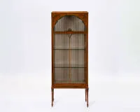Elegant Sheraton Revival display cabinet, England, circa 1900, satinwood veneered, partially polychrome painted and carved, tall rectangular and three-sided glazed body on four slender, tapering square legs with spade feet, one glazed...