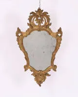 Rococo mirror, Louis XV, circa 1765, frame in curved rocaille form with openwork cartouche, 82 x 45 cm, restorations
