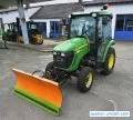 John Deere 3520 all-wheel drive compact tractor with hydraulic snow plow and front loader from 2013