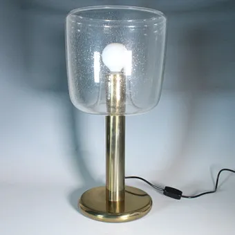 COSACK. Mid-century brass table lamp with a glass shade from the 1970s.