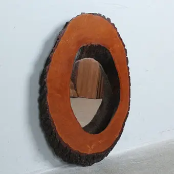 Wall mirror with tree slice frame.