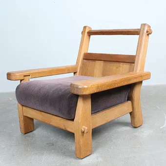 DE PUYDT. Brutalist armchair in solid oak, 1960s, Belgium.