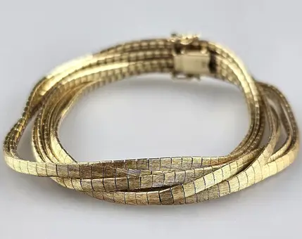 GOUDEN ARMBAND - Italië jaren 1960/70, geelgoud 585/000.