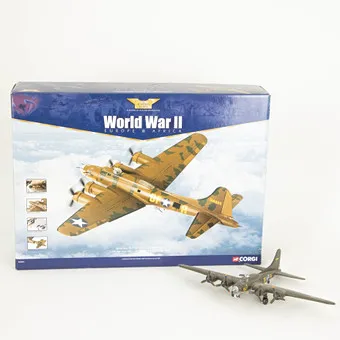 Two airplane models: Corgi Boeing B-17 in original box and a small "Memphis Belle" model (2).
