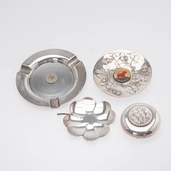 CHRISTOFLE. Three ashtrays and a small lidded box, Paris, 20th c. (4).