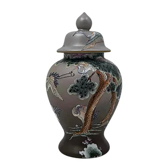 CHINESE PORCELAIN COVERED VASE WITH STYLIZED PINE BRANCHES AND CRANES.