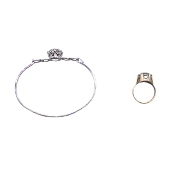 ANTIKES SCHMUCKSET AUS 835ER SILBER ARMBAND UND 925ER SILBER RING.