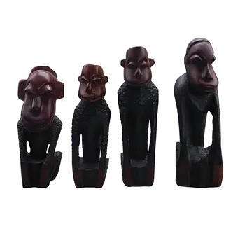 SET DE 4 FIGURINES AFRICAINES EN BOIS SINGES.