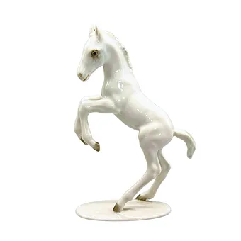 MAX FRITZ. PORCELÁNOVÁ FIGURKA HŘÍBĚTE, HUTSCHENREUTHER KUNSTABTEILUNG.