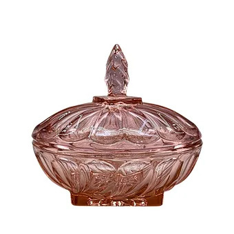 Roze bonbonnière van geperst glas.