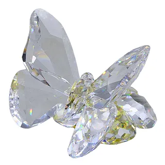 SWAROVSKI PAPILLON SUR UNE FLEUR.