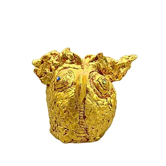 SCULPTURE ABSTRAITE DE HIBOU EN ARGILE MODELÉE ET DORÉE.