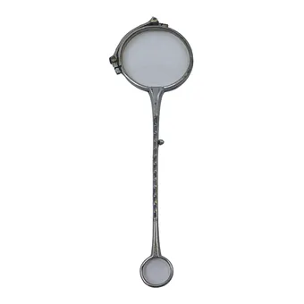 Lorgnette à mécanisme pliant.