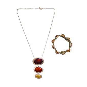 TWO-PART SET CONSISTING OF NECKLACE WITH THREE-PART PENDANT AND MATCHING LINK BRACELET.