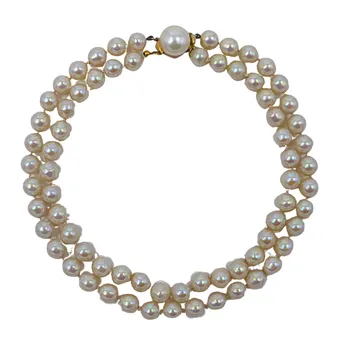 CHRISTIAN DIOR PERLENKETTE 1973.