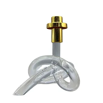 Dorothy Thorpe. Mid-century brass and acrylic pretzel candle holder.
