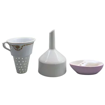 Three-part tea and coffee filter set made of porcelain and ceramic.
