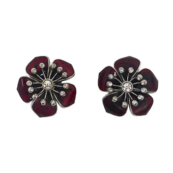 Clips d'oreilles en forme de fleur avec strass.